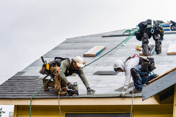 Professional Gutter Installation technician working in Lavallette, NJ